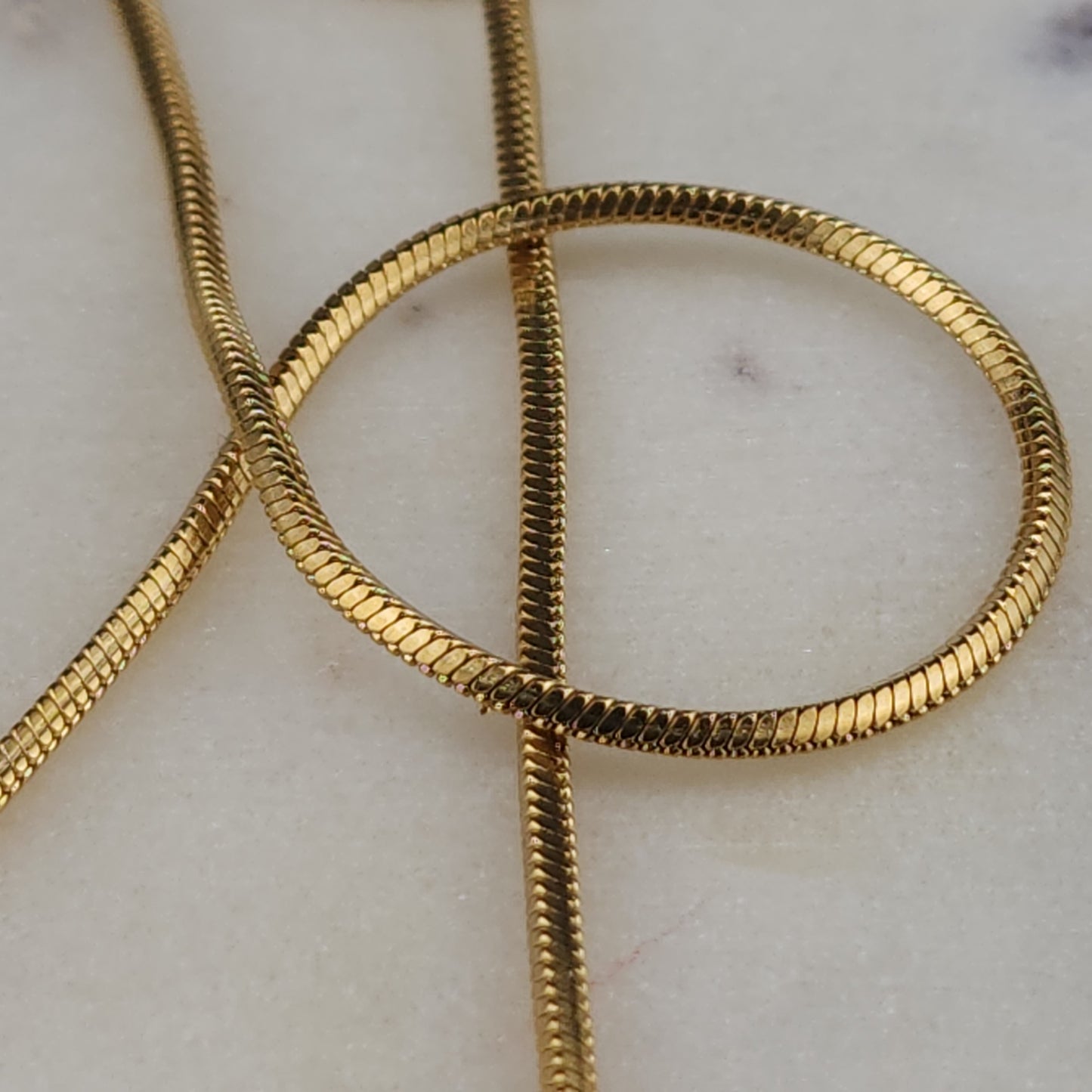 Virgen de Guadalupe Medallion Necklace

18K Gold Plated · Cubic Zirconia · Square Snake Chain