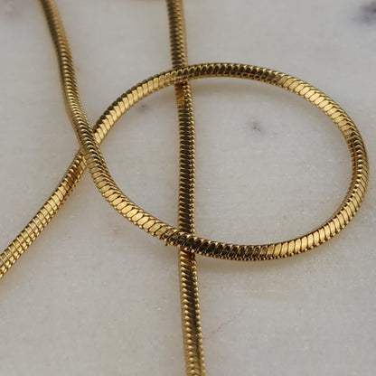 Virgen de Guadalupe Medallion Necklace

18K Gold Plated · Cubic Zirconia · Square Snake Chain