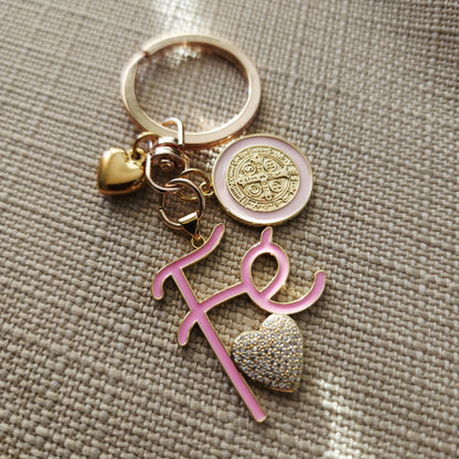 Faith-inspired St. Benedict keychain featuring Fe charm and heart detail, gold plated religious keepsake