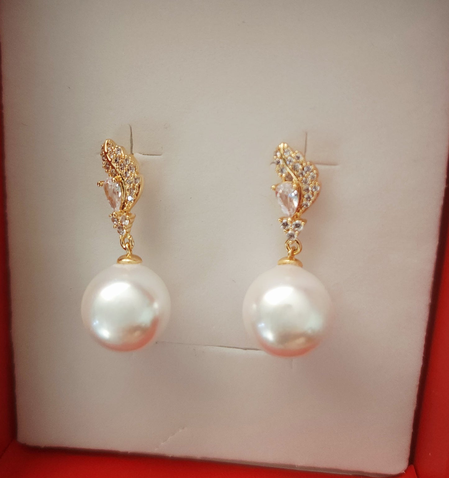 Aurea Vigilat — White Pearl Drop Earrings-Feather-Posts