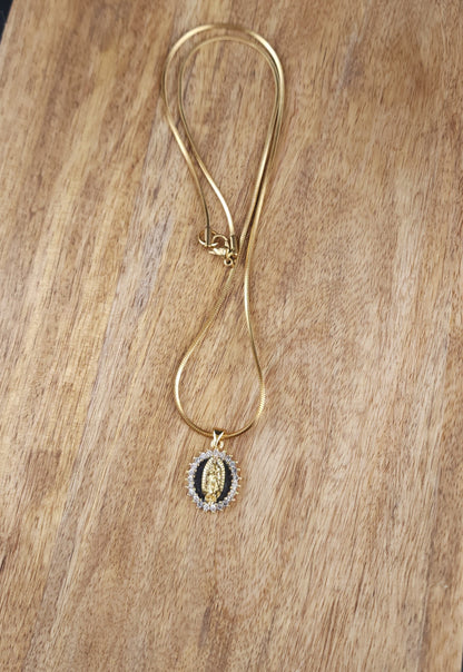 Virgen de Guadalupe Medallion Necklace

18K Gold Plated · Cubic Zirconia · Square Snake Chain