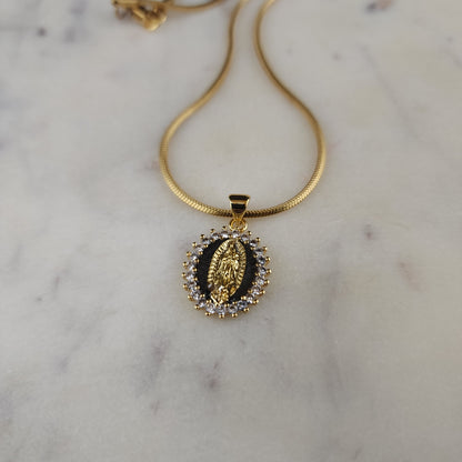 Virgen de Guadalupe Medallion Necklace

18K Gold Plated · Cubic Zirconia · Square Snake Chain