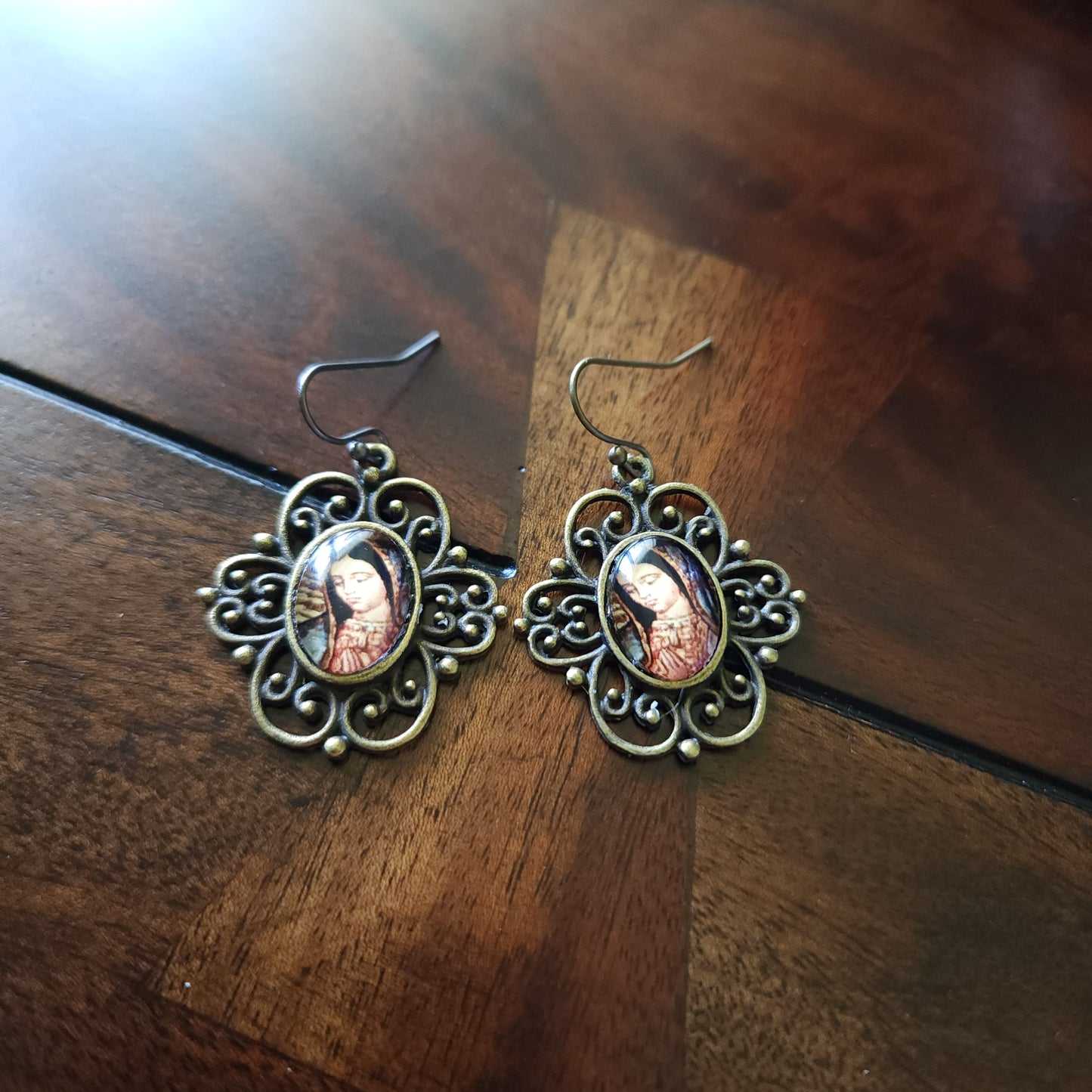 Sub Pallio Eius

Our Lady of Guadalupe earrings.
