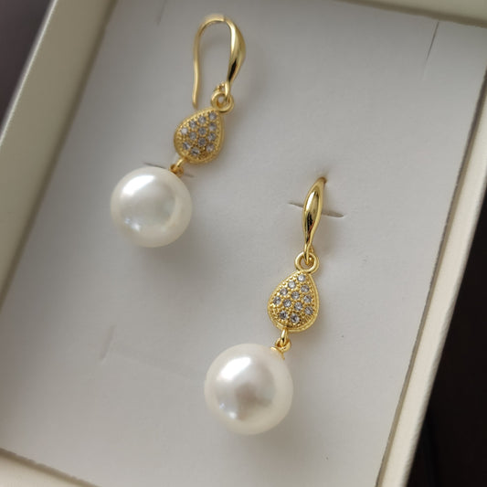 Aurea Vigilat — White Pearl Drop Earrings